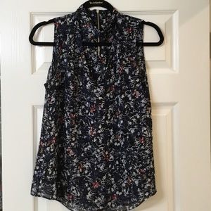 WHBM Multi colored black v-neck blouse. Sz 4